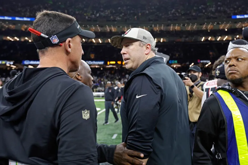 Smith y Dennis Allen al final del partido