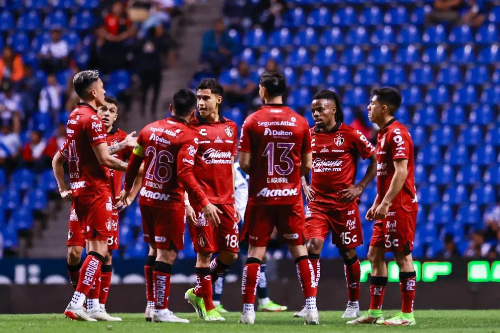 Los rojinegros en la visita a La Franja