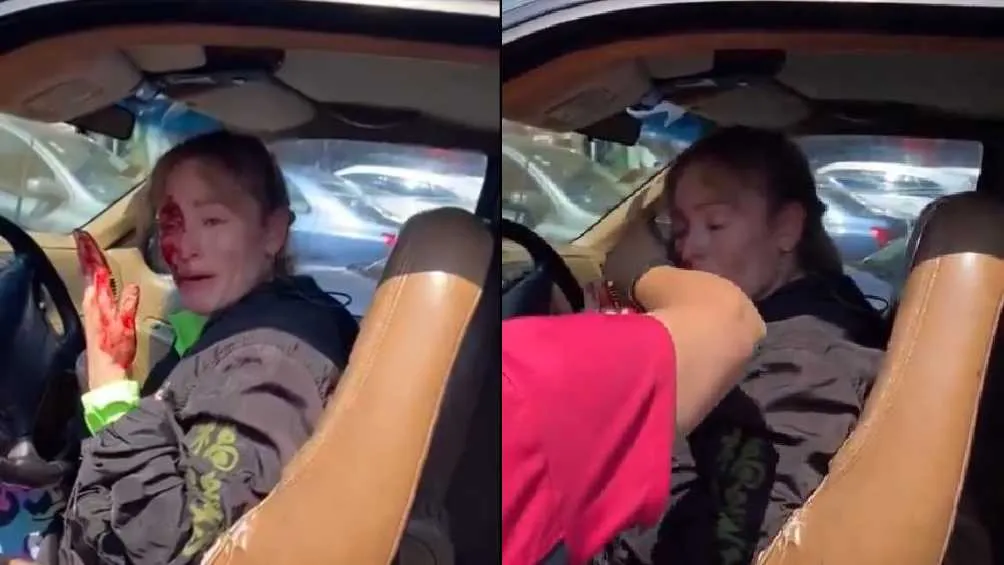 CAPTURA DE PANTALLA: @ultimahoraenx La mujer bañada en sangre fue auxiliada por testigos del hecho.