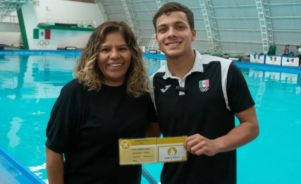 Kevin y María José Alcalá, presidenta del COM
