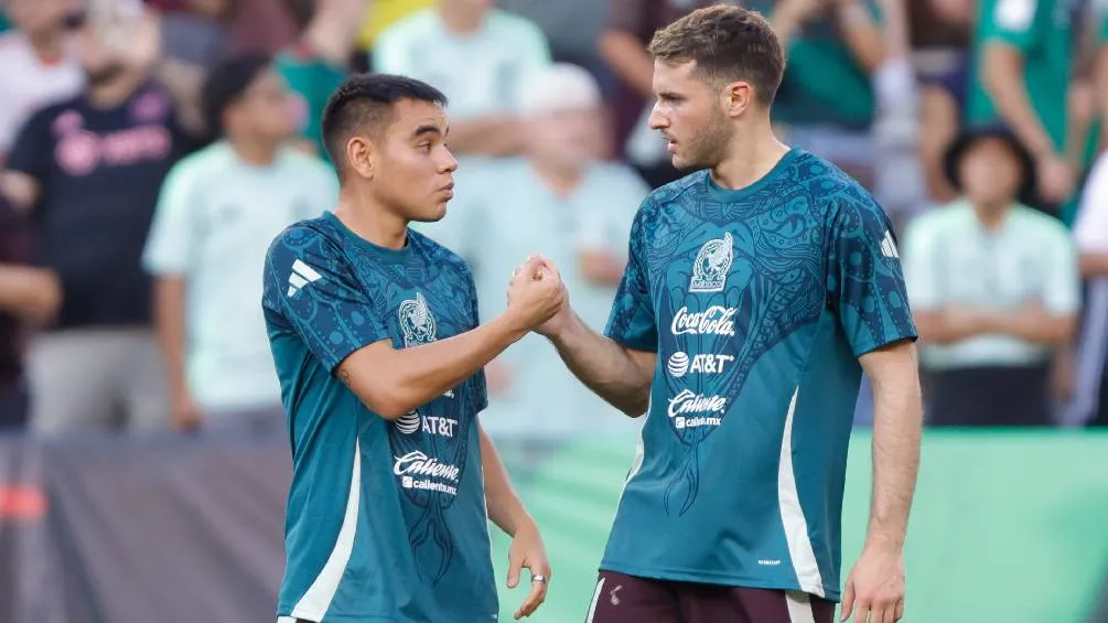 Charly Rodríguez con Santi Giménez