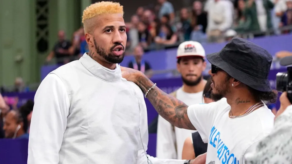 Lewis Hamilton con Miles Chamley-Watson