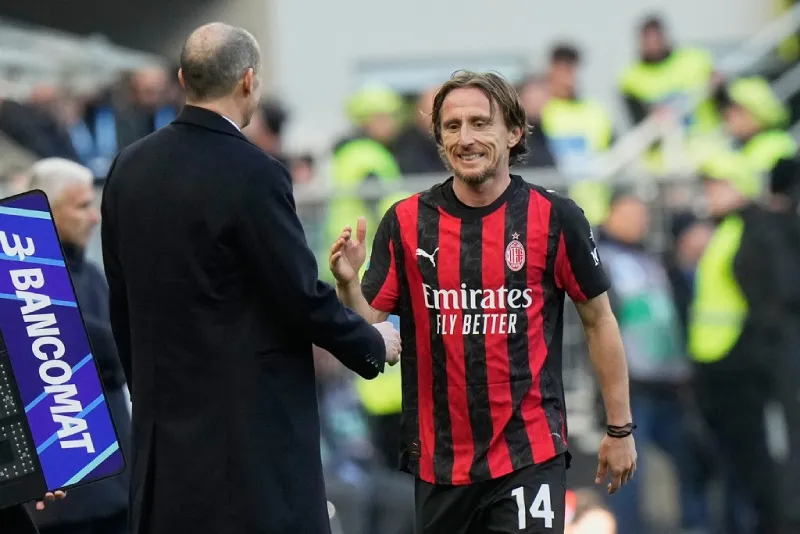Modric en saludo con Allegri