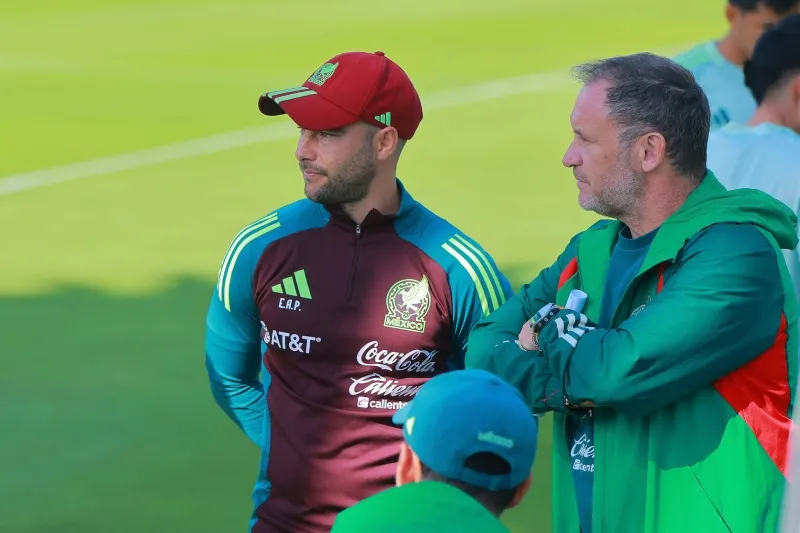 Eduardo Arce con Andrés Lillini, director de selecciones nacionales menores