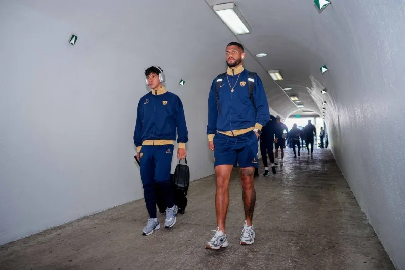 Robert Morales y José Caicedo en su llegada a CU