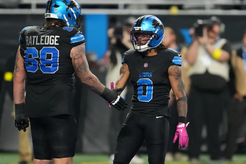 Gibbs en celebración con Ratledge