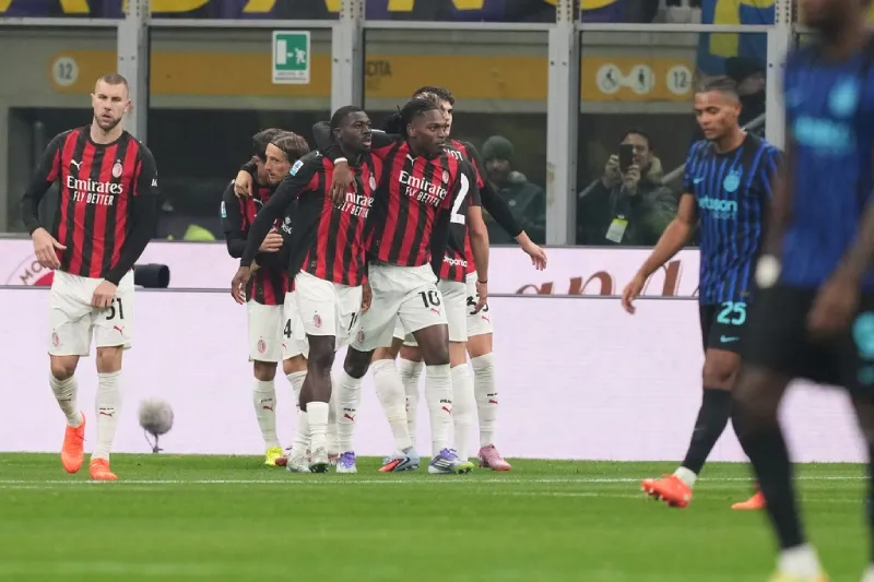 Jugadores de AC Milan en festejo de gol
