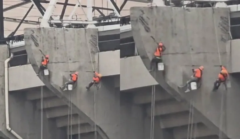 Trabajadores en las afueras del Azteca