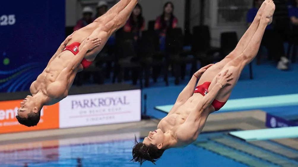 Osmar y Celaya durante la competencia | AP