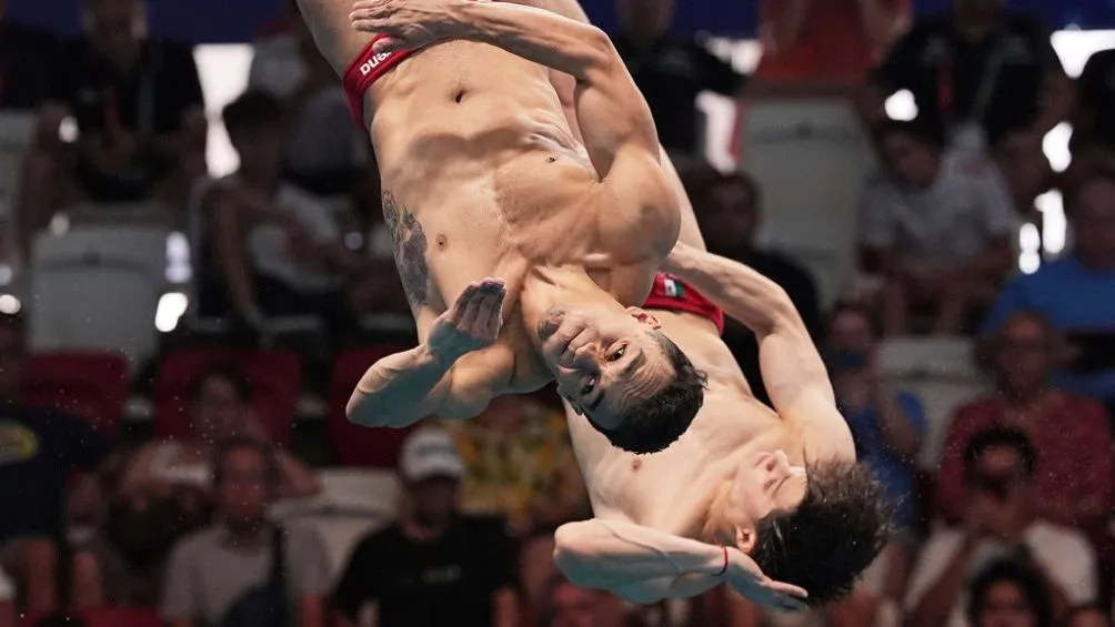 Osmar y Celaya durante la competencia | AP