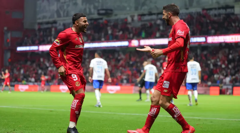 Vega y Paulinhon celebrando con Toluca | IMAGO7