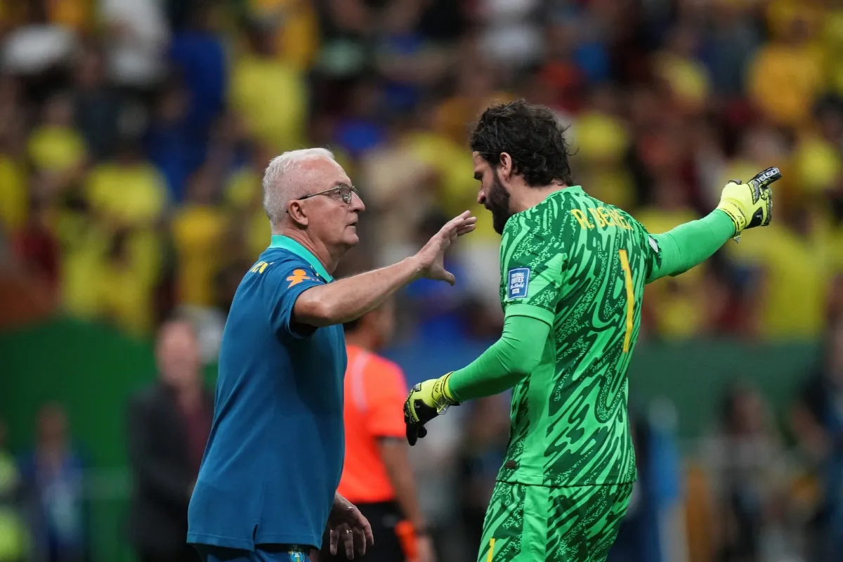 Dorival y Alisson | AP
