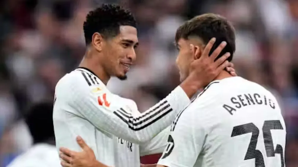 Asencio celebra con Bellingham | AP