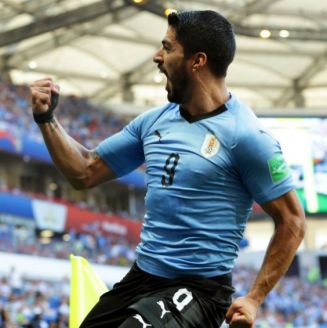 Luis Suárez festeja su gol contra Arabia Saudita
