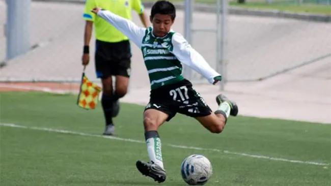 Ronaldo Zinedin a punto de disparar