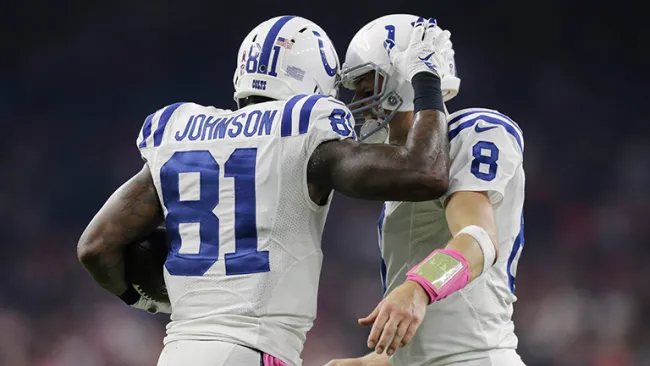 Andre Johnson festeja con Matt Hasselbeck