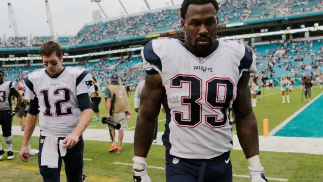 Jackson y Tom Brady lamentando la derrota de Patriotas