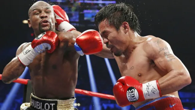 Floyd y Pacquiao en el intercambio de golpes