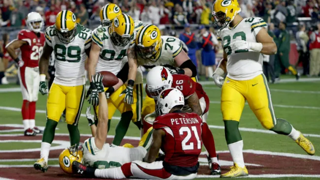 Jugadores de Green Bay previo al festejo con Janis