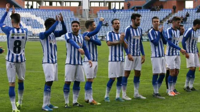 Jugadores del Huelva antes de un partido