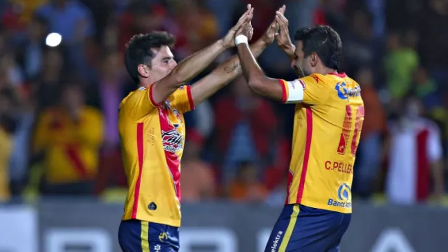 Erpen y Pellerano festejan tras una anotación