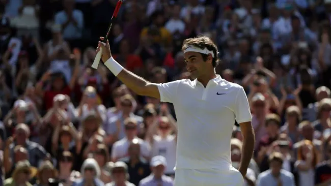 Roger Federer celebra su victoria 307, en Wimbledon
