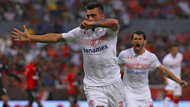 Triverio festeja el empate contra Atlas