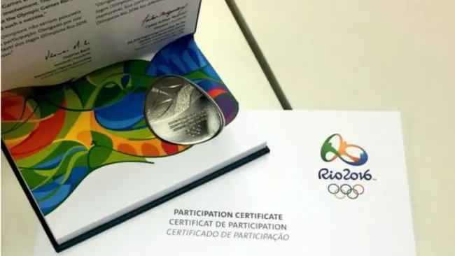 Medalla y certificado de participación en la cobertura de Juegos Olímpicos 