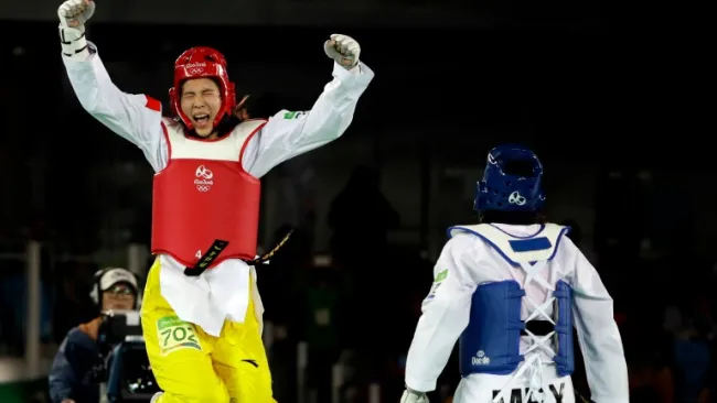 La china Shuyin Zheng celebra su triunfo frente a María Espinoza