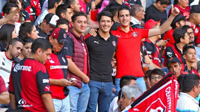 Aficionados rojinegros durante el festejo del Centenario de del Atlas