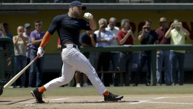 Tim Tebow se pone al bat 