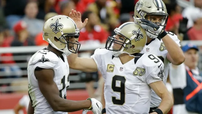 Drew Brees felicita a Michael Thomas tras un TD