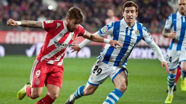 Cristian Portugués y Fran Beltrán durante el partido