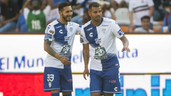 Ismael Sosa y Edwin Cardona festejan un gol