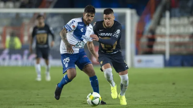 Guzmán e Iturbe, durante un partido