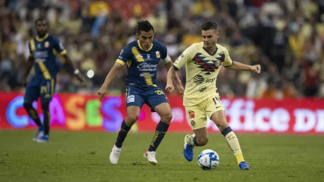 Rocha y Benedetti, durante un partido