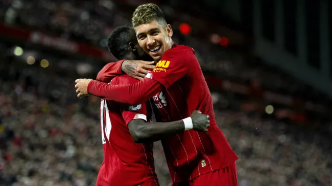 Firmino celebrando la victoria del Liverpool