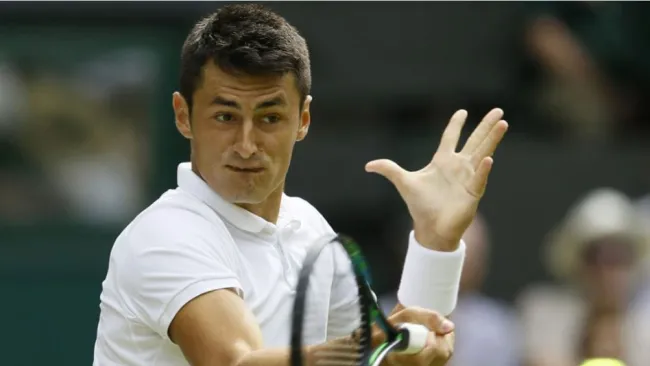 Tomic, durante un partido de tenis
