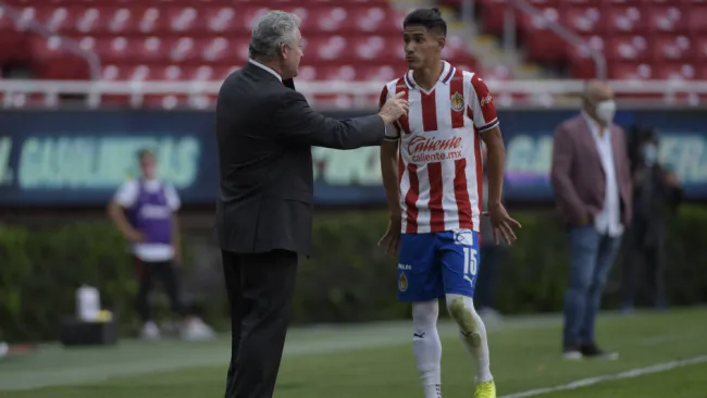 Vucetich en plática con Uriel Antuna