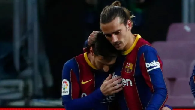 Lionel Messi y Antoine Griezmann en un partido con el Barcelona