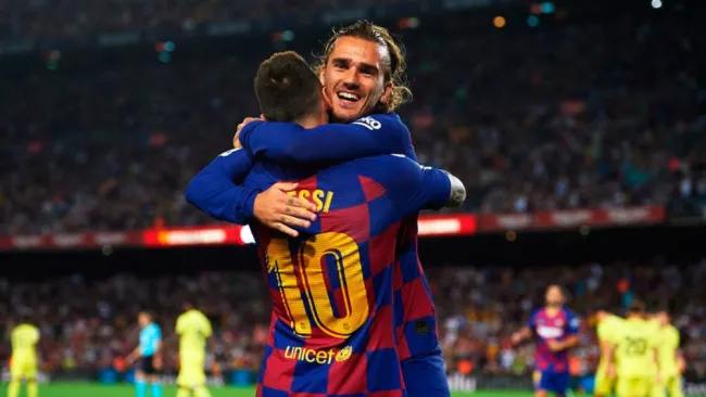 Messi y Griezmann en festejo