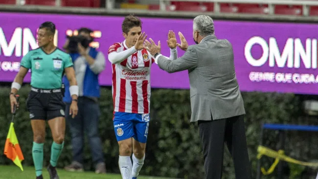 Brizuela y Vucetich durante un partido con Chivas