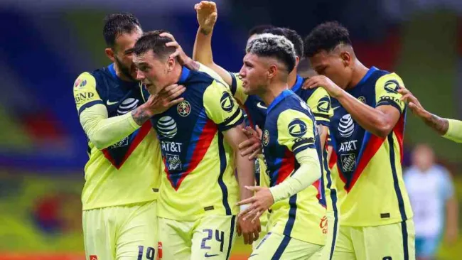 Jugadores de América en festejo