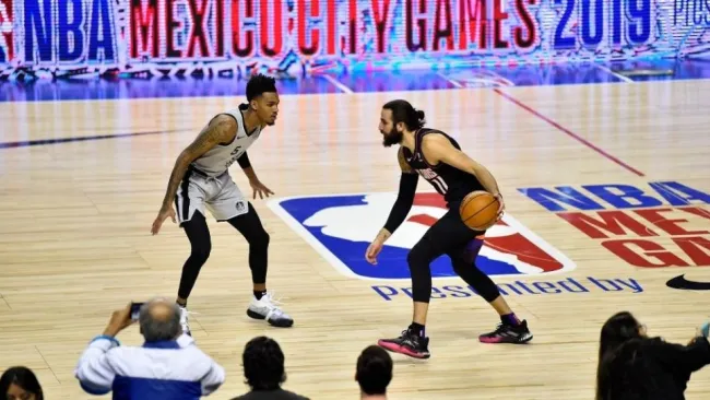 Dejounte Murray y Ricky Rubio durante el partido