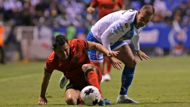 Acosta y Ferrareis durante el partido