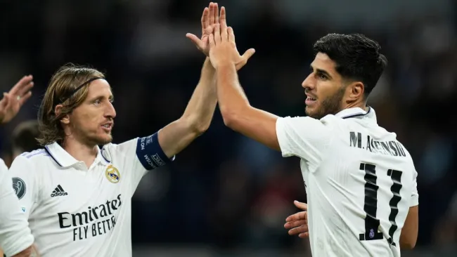 Luka Modric festeja con Asensio