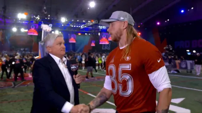 John Sutcliffe retó a George Kittle en la lucha libre