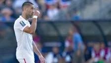 Dempsey celebra un gol en un partido con su selección