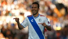Luis Gabriel Rey festeja un gol con Puebla