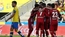 Los jugadores del Atlético celebran uno de los goles de Griezmann